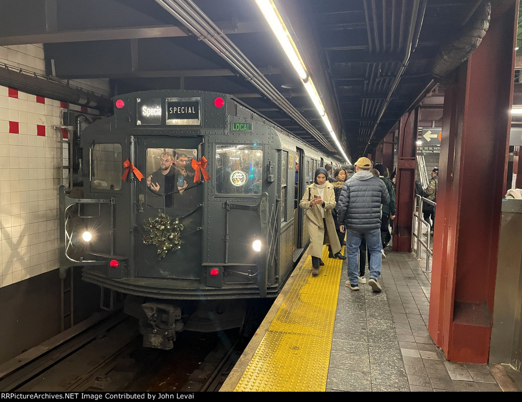 The first trip of the NYCTA Holiday Train stopped at 34th St-Herald Square Station heading northbound to 96th St 